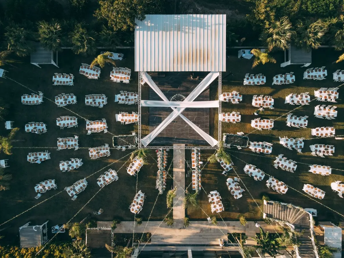 Aerial view of tables and chairs arranged for an outdoor event